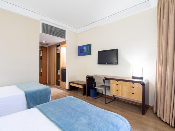 Golden Tower Pinheiros by Fênix Hotéis : photo 3 de la chambre chambre lits jumeaux pour personnes à mobilité réduite