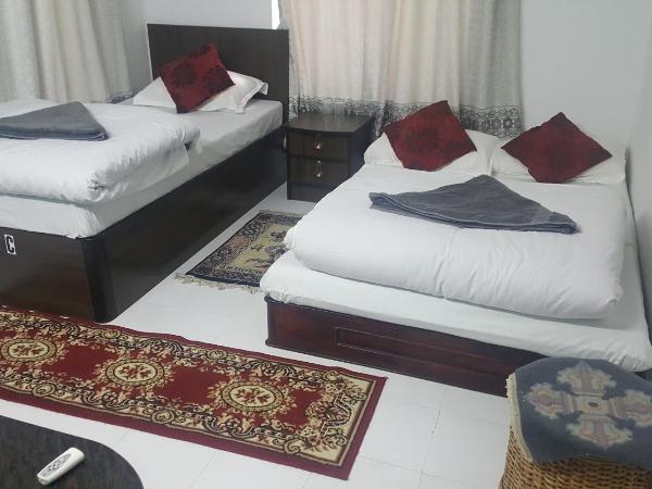 BnB Royal Tourist House : photo 9 de la chambre chambre lit queen-size