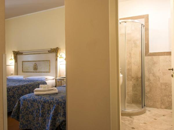 Relais Tiffany : photo 3 de la chambre chambre triple - vue sur jardin