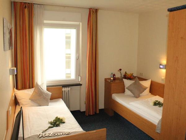 Hotel Austria Stuttgart-City : photo 1 de la chambre chambre lits jumeaux standard