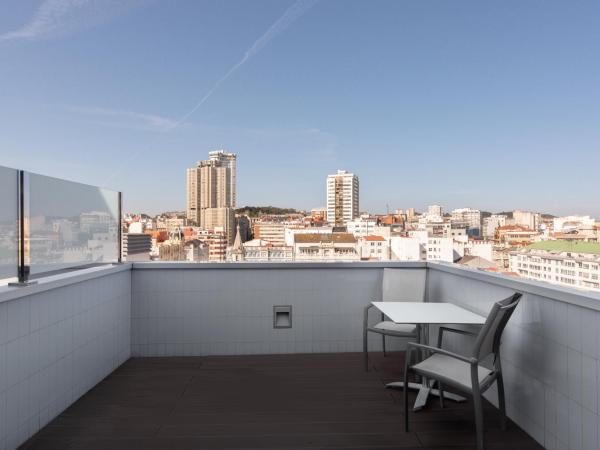 Eurostars Blue Coruña : photo 6 de la chambre chambre double ou lits jumeaux avec terrasse