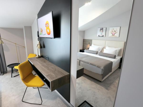 Hotel Milenij : photo 7 de la chambre chambre double standard - vue sur jardin