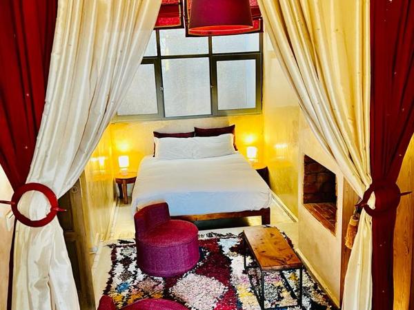 Dar Les Sirènes : photo 1 de la chambre chambre rousse