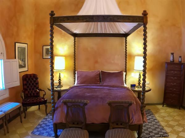 La Perla Hotel Boutique B&B : photo 8 de la chambre grande chambre lit queen-size