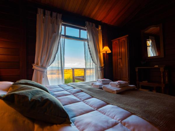 Hostería El Galpón Del Glaciar : photo 1 de la chambre chambre triple