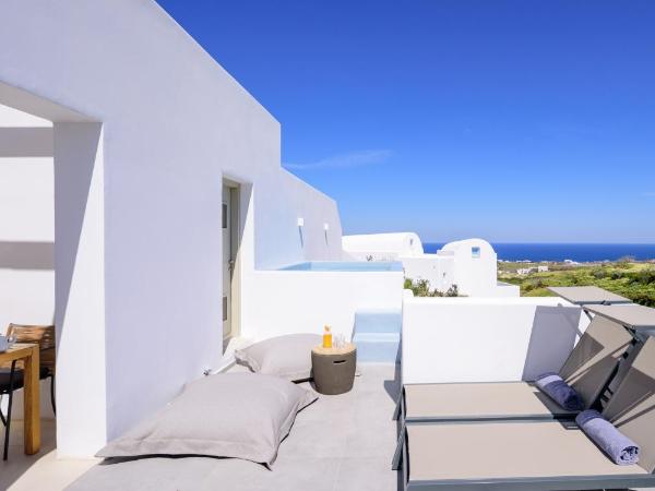 Este Luxury Suites : photo 8 de la chambre suite junior avec bain à remous - vue sur mer