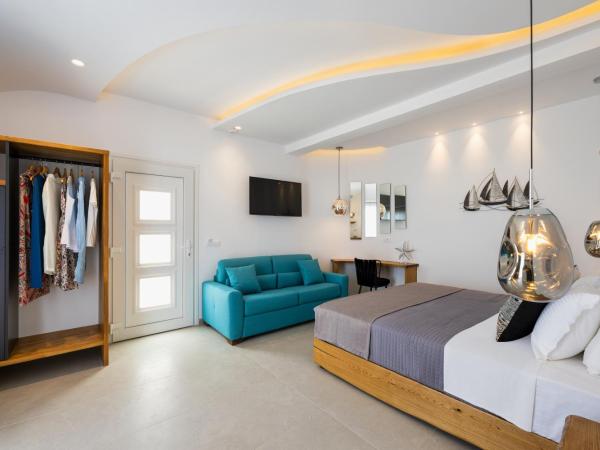 Alizea Villas & Suites : photo 7 de la chambre suite lit queen-size avec baignoire spa