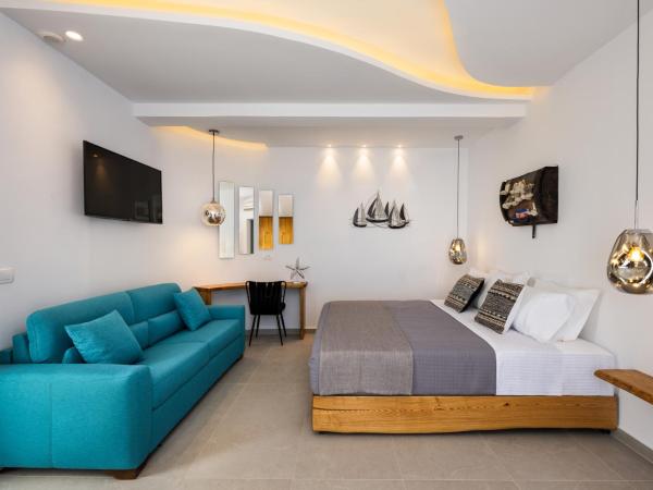 Alizea Villas & Suites : photo 10 de la chambre suite lit queen-size avec baignoire spa