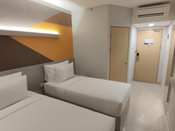 Agogo Downtown Hotel Surabaya : photo 4 de la chambre chambre lits jumeaux supérieure