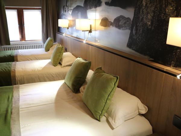 Le Mouton Blanc : photo 2 de la chambre chambre quadruple