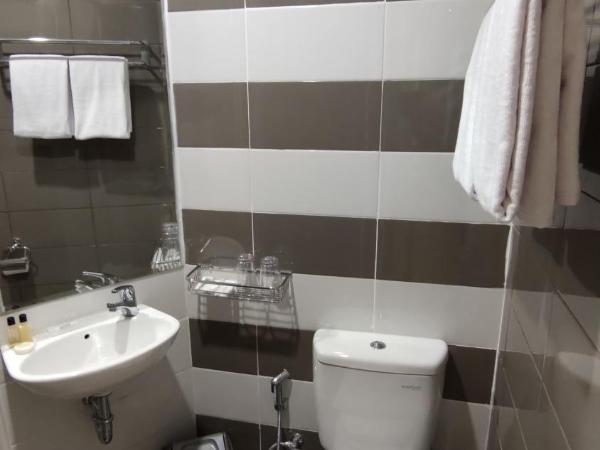 Agogo Downtown Hotel Surabaya : photo 4 de la chambre chambre lit king-size deluxe