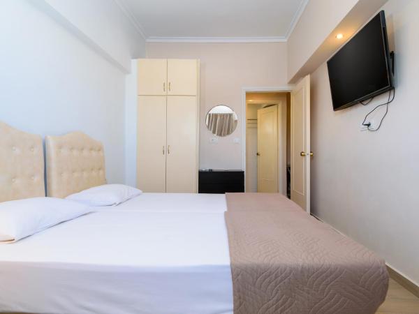 Archontiki City Hotel : photo 2 de la chambre chambre quadruple