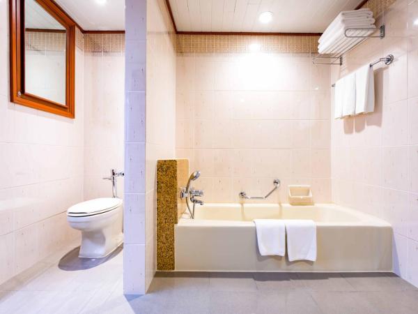 Centara Riverside Hotel Chiang Mai : photo 2 de la chambre suite junior double avec 2 lits doubles