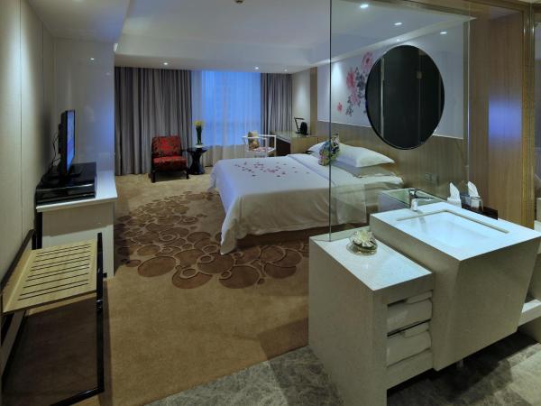 Paco Hotel Tuanyida Metro Guangzhou-Canton Fair free shuttle bus : photo 3 de la chambre chambre lit queen-size de luxe