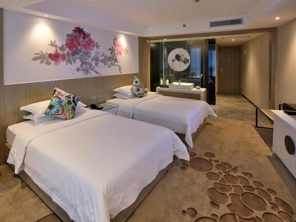 Paco Hotel Tuanyida Metro Guangzhou-Canton Fair free shuttle bus : photo 3 de la chambre chambre lits jumeaux deluxe