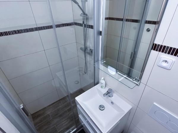 Minihotel Vitex : photo 2 de la chambre chambre lits jumeaux avec salle de bains privative séparée