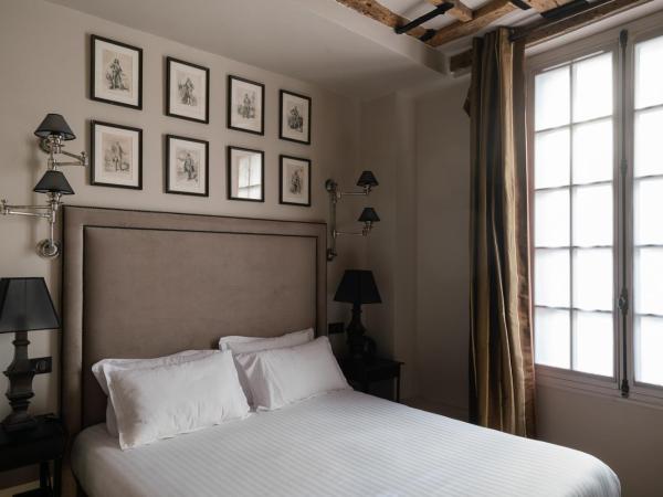 Hotel Saint-Louis en L'Isle - Notre-Dame : photo 2 de la chambre chambre deluxe double ou lits jumeaux