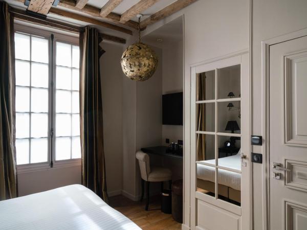 Hotel Saint-Louis en L'Isle - Notre-Dame : photo 1 de la chambre chambre deluxe double ou lits jumeaux