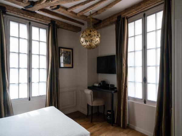 Hotel Saint-Louis en L'Isle - Notre-Dame : photo 3 de la chambre chambre double supérieure pour personnes à mobilité réduite