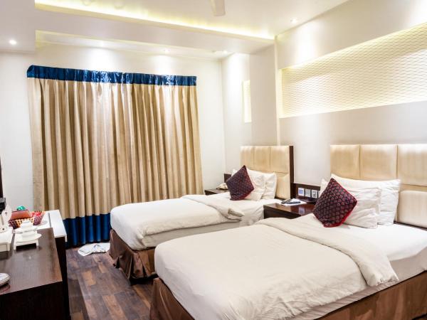 Hotel Grand Godwin - Near New Delhi Railway Station - Paharganj : photo 7 de la chambre chambre deluxe double ou lits jumeaux