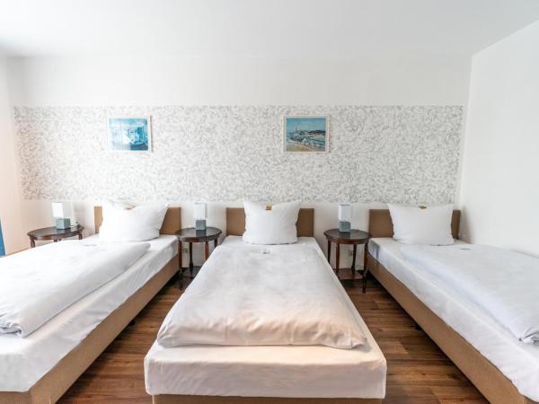 Hotel Am Kamp : photo 1 de la chambre chambre triple