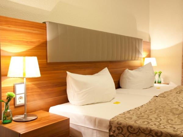 Hotel Frankfurt Messe : photo 4 de la chambre chambre double ou lits jumeaux avec salle de bains privative