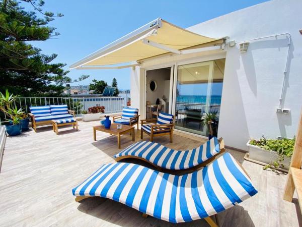 Il Profumo del Mare : photo 1 de la chambre suite lit king-size - vue sur mer