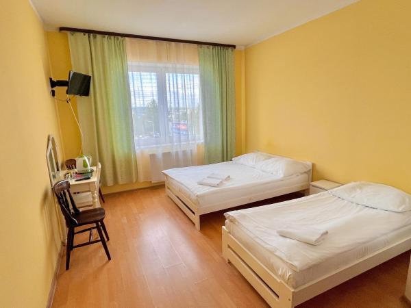 Hostel DV Morski - z prywatnymi łazienkami : photo 6 de la chambre chambre triple avec salle de bains