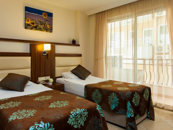 Oba Time Hotel : photo 2 de la chambre chambre triple