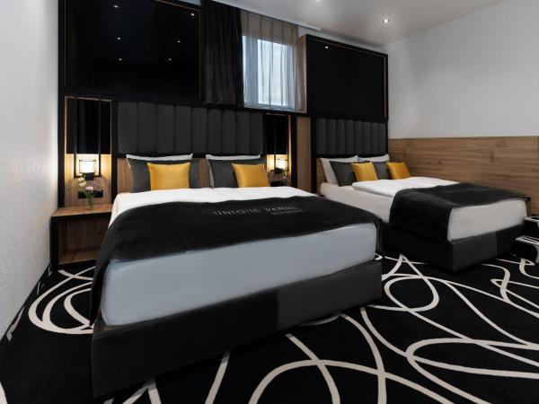 Hotel Unique Pearl : photo 1 de la chambre chambre double familiale