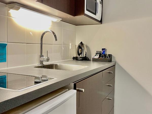 Airport Delta Motel : photo 3 de la chambre studio lit king-size