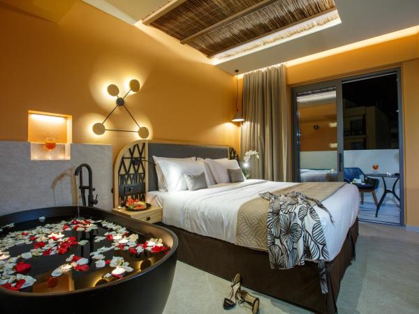 Palmera Beach Hotel & Spa - Adults Only : photo 1 de la chambre suite romantique deluxe avec jacuzzi