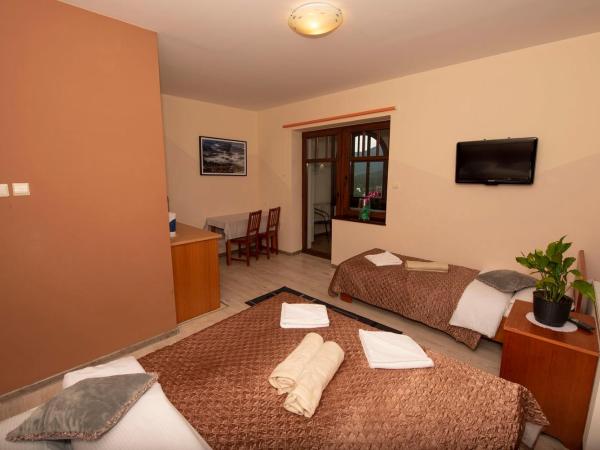 Rezydencja Na Skrócie : photo 5 de la chambre chambre triple