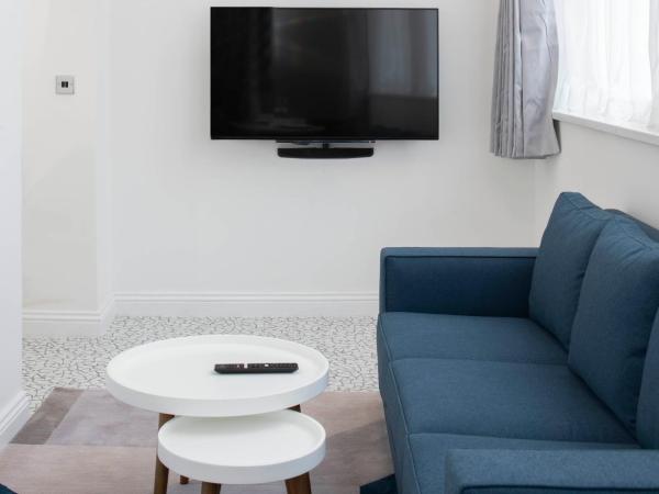 Trueman Court Luxury Serviced Apartments : photo 3 de la chambre appartement en duplex