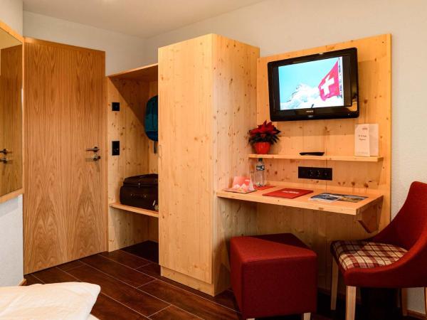 Hotel Caprice - Grindelwald : photo 3 de la chambre hébergement simple confort