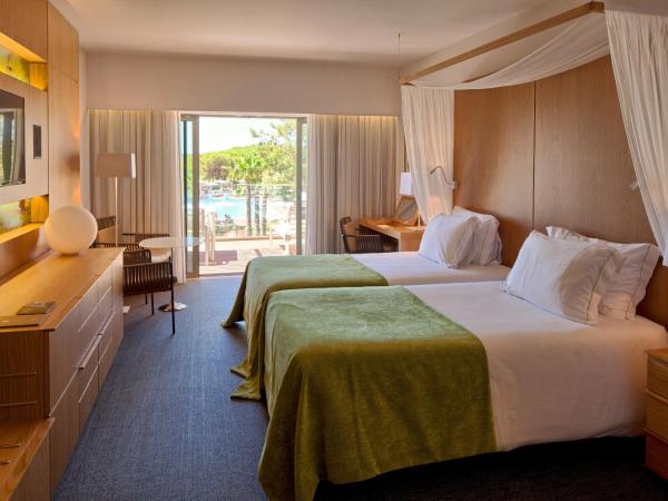 EPIC SANA Algarve Hotel : photo 1 de la chambre chambre double ou lits jumeaux deluxe - vue sur piscine