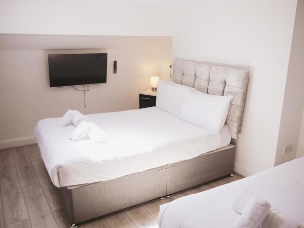 Hotel Anfield : photo 2 de la chambre chambre quadruple avec salle de bains privative