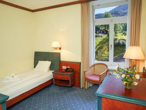 Thermal Hotels & Walliser Alpentherme Leukerbad : photo 1 de la chambre chambre simple deluxe grand bain