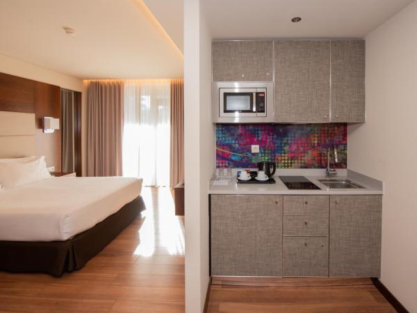 Eurostars Oporto : photo 4 de la chambre appartement avec balcon