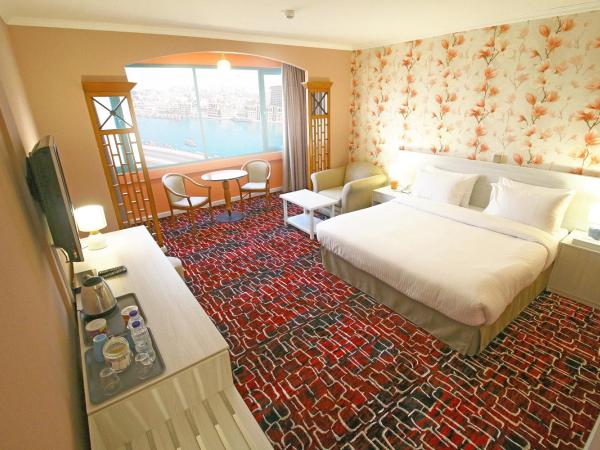 The George Hotel by Saffron, Dubai Creek : photo 5 de la chambre chambre premier - vue sur crique et quartier heritage