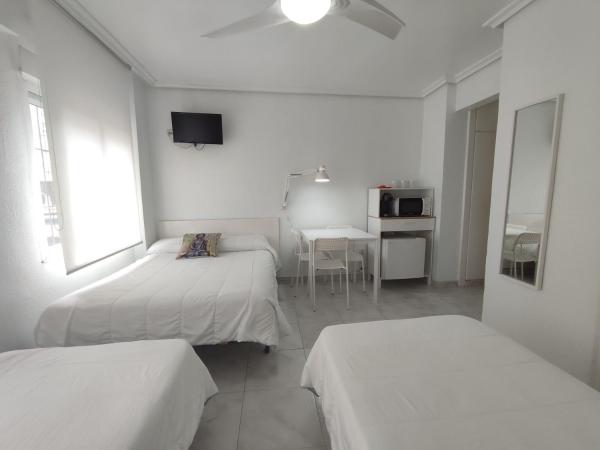 Hostal Lucy : photo 2 de la chambre chambre quadruple