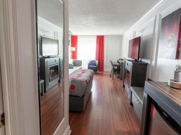 Hotel Plaza Quebec : photo 5 de la chambre chambre signature avec cheminée, 1 lit queen-size et 1 lit escamotable queen-size - vue sur extérieur