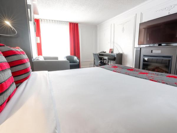 Hotel Plaza Quebec : photo 2 de la chambre chambre signature avec cheminée, 1 lit queen-size et 1 lit escamotable queen-size - vue sur extérieur