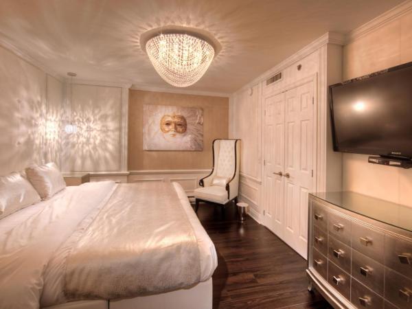 Hotel Plaza Quebec : photo 1 de la chambre suite blanche premium avec 1 lit king-size et 1 lit escamotable queen-size