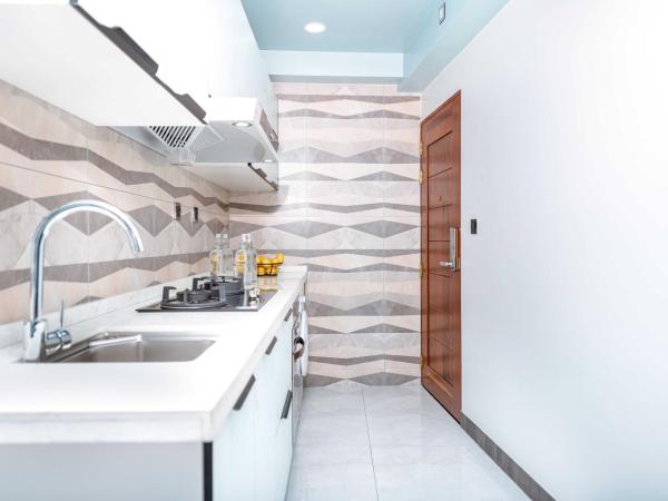 Marukab Plaza : photo 7 de la chambre two-bedroom suite with partial sea view (free return airport transport)