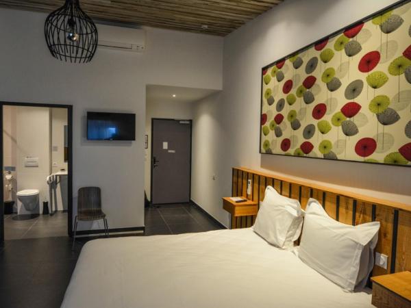 Cit'Hotel Le Relais du Boisniard : photo 7 de la chambre chambre quadruple avec douche
