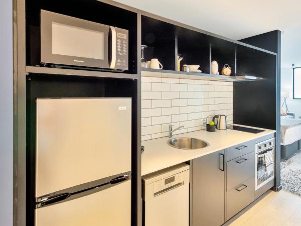 Roomie Apartment Hotel : photo 6 de la chambre studio lits jumeaux