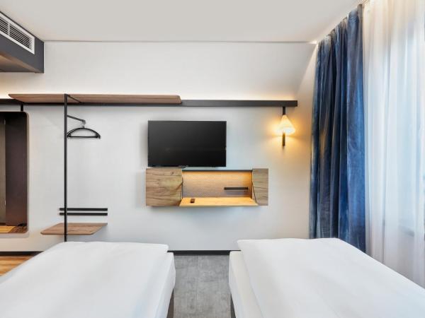 H2 Hotel Düsseldorf City : photo 8 de la chambre chambre lits jumeaux standard