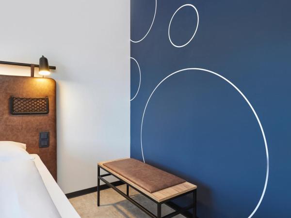 H2 Hotel Düsseldorf City : photo 6 de la chambre chambre lits jumeaux standard