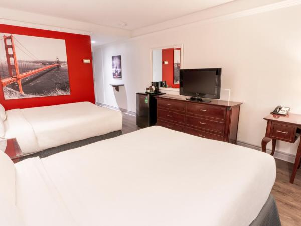 Hôtel Québec Inn : photo 3 de la chambre chambre traditionnelle avec 2 lits doubles et terrasse intérieure - côté piscine